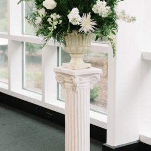 Two Columns With Floral Arrangements